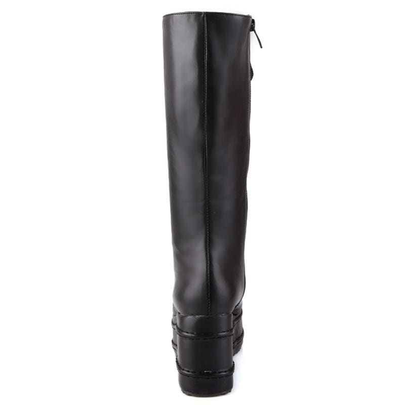 Black leather platform wedge knee high moto boots shown from the back with chunky heel and zipper details
