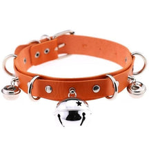 Orange faux leather bell collar with silver metal hardware and dangling bells for cats