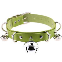 A lime green faux leather bell collar for cats with metal hardware featuring a central star bell and two smaller bells