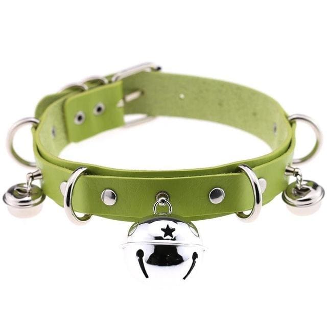 A lime green faux leather bell collar for cats with metal hardware featuring a central star bell and two smaller bells