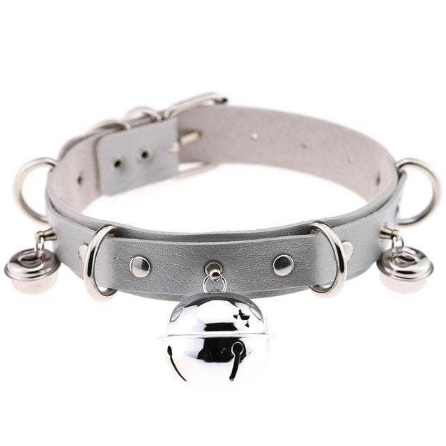 Silver pleather cat bell collar with faux leather, large central bell, smaller bells, metal hardware, and studs