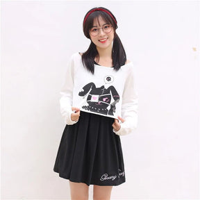 White long sleeve bunny dress with black cartoon rabbit graphic and pink accents perfect for a two piece stunning look