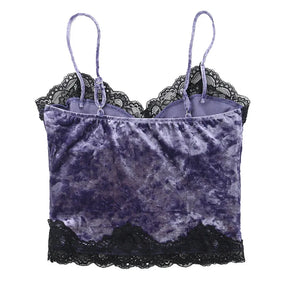 Purple camisole laid flat from the back, showing two slim adjustable straps and black lace around the lower edge.