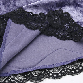 Inside lower edge of the purple camisole, showing the stitched seam and black scalloped lace trim.