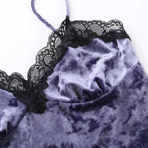 Detail of the purple velvet bust panel and black scalloped lace neckline.