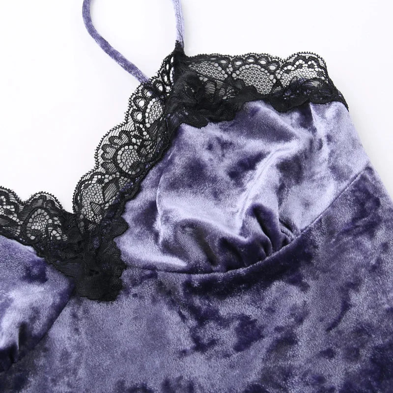 Detail of the purple velvet bust panel and black scalloped lace neckline.