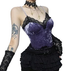 Angled view of a purple velvet camisole with black floral lace, narrow shoulder straps and curved bust seams.