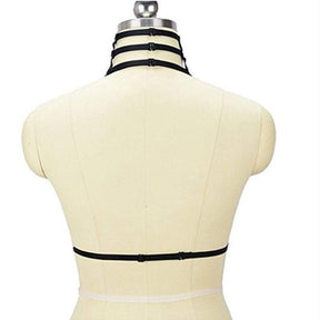 Black ribbed elastic strap harness with adjustable buckles for a snug fit around neck and waist