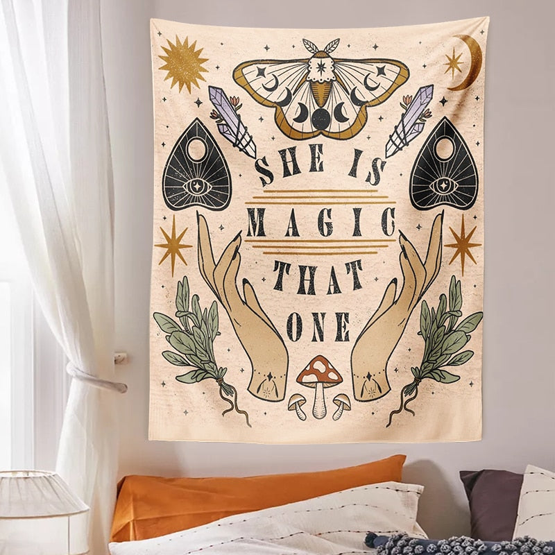She Is Magic That One tapestry hung above a bed beside a bright window, showing the full rectangular illustration.