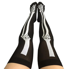 Black thigh-high skeleton bone stockings with bold white skeletal design running down each leg for spooky style