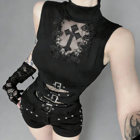 Sleeveless cross cutout top showing lace trim and curved buckle openings