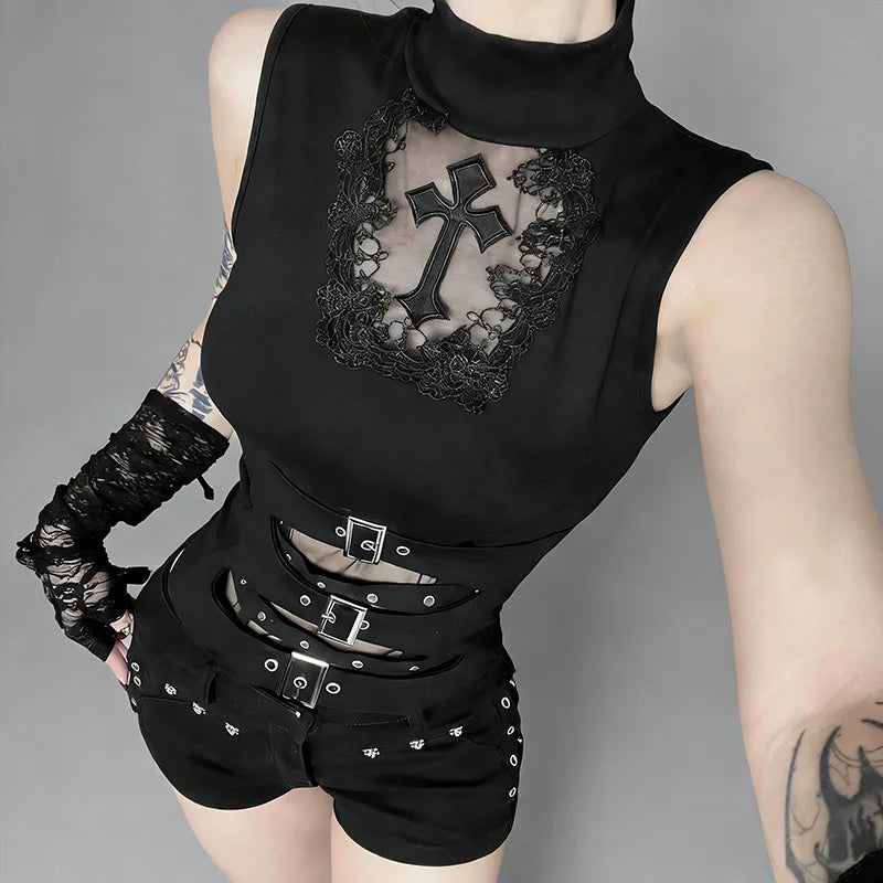 Sleeveless cross cutout top showing lace trim and curved buckle openings