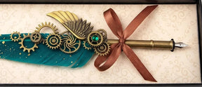 Green feather quill pen close-up with decorative gears, a wing and ribbon bow