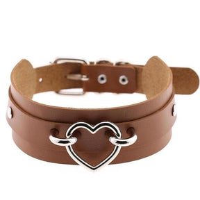 Brown vegan leather heart collar with silver heart-shaped buckle perfect for edgy fashion looks