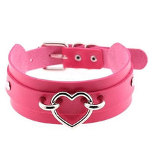 A vibrant pink vegan leather heart choker with double layers and a silver heart buckle with interlocking rings