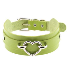 A lime green vegan leather heart double-layered choker with silver heart buckle and metallic studs