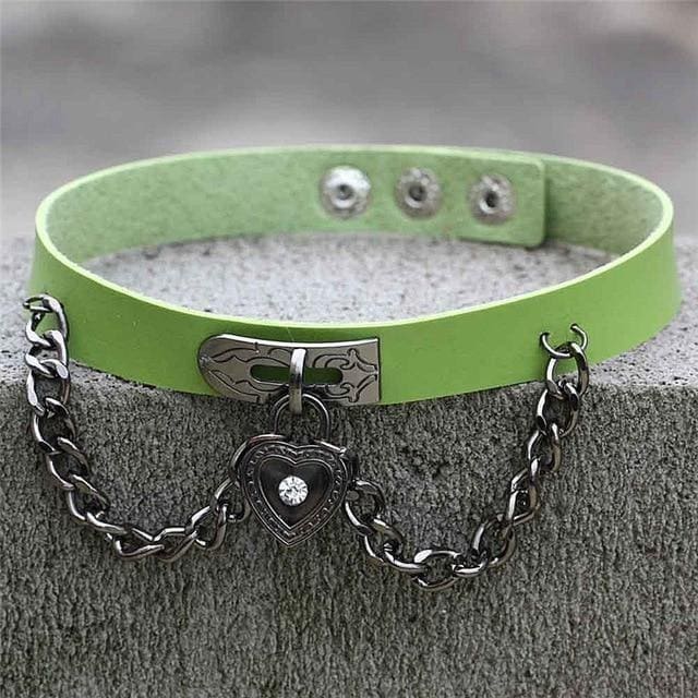 Victorian locket choker with a lime green leather band, black chain, and heart locket pendant in edgy style