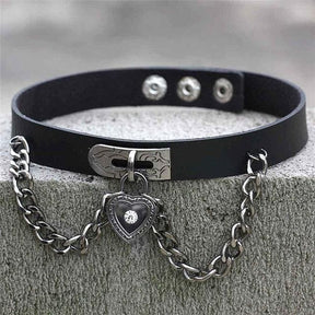 Black leather locket choker with silver heart locket pendant featuring clear gemstone on chain clasp