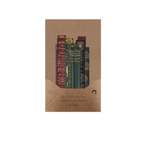 Brown decorative sticker packet filled with narrow book-spine designs in muted burgundy, green and gold-toned print.