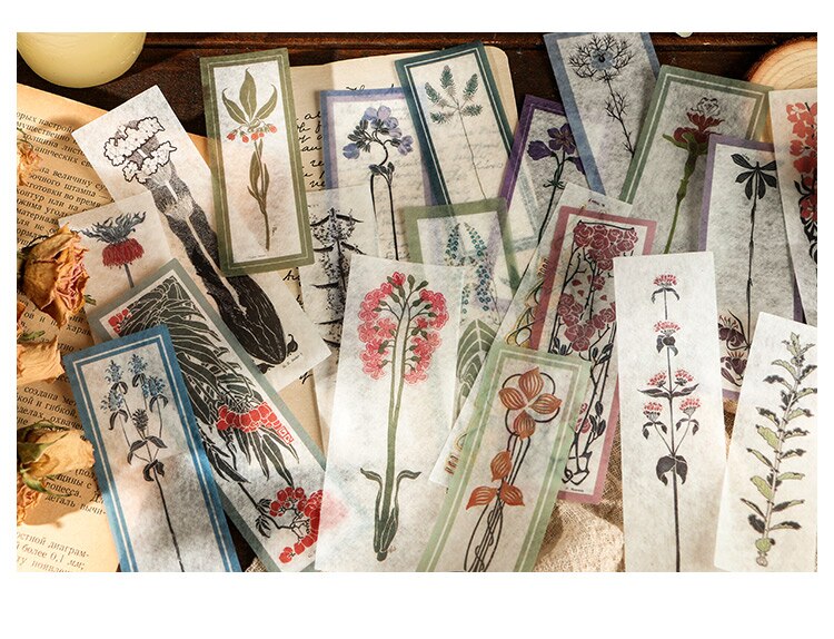 Long botanical stickers show individual flower stems and decorative borders in green, red and blue tones.
