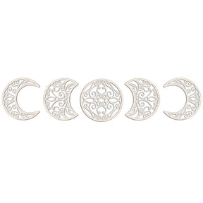 Five white moon-phase cutouts isolated on a plain background, each filled with decorative open scrollwork.