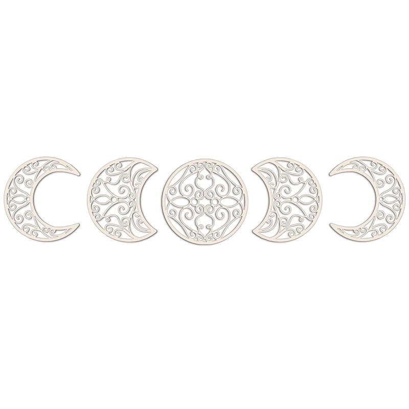 Five white moon-phase cutouts isolated on a plain background, each filled with decorative open scrollwork.