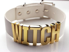 Gold-colored witch collar belt buckle on white vegan leather strap for choker necklace style accessory