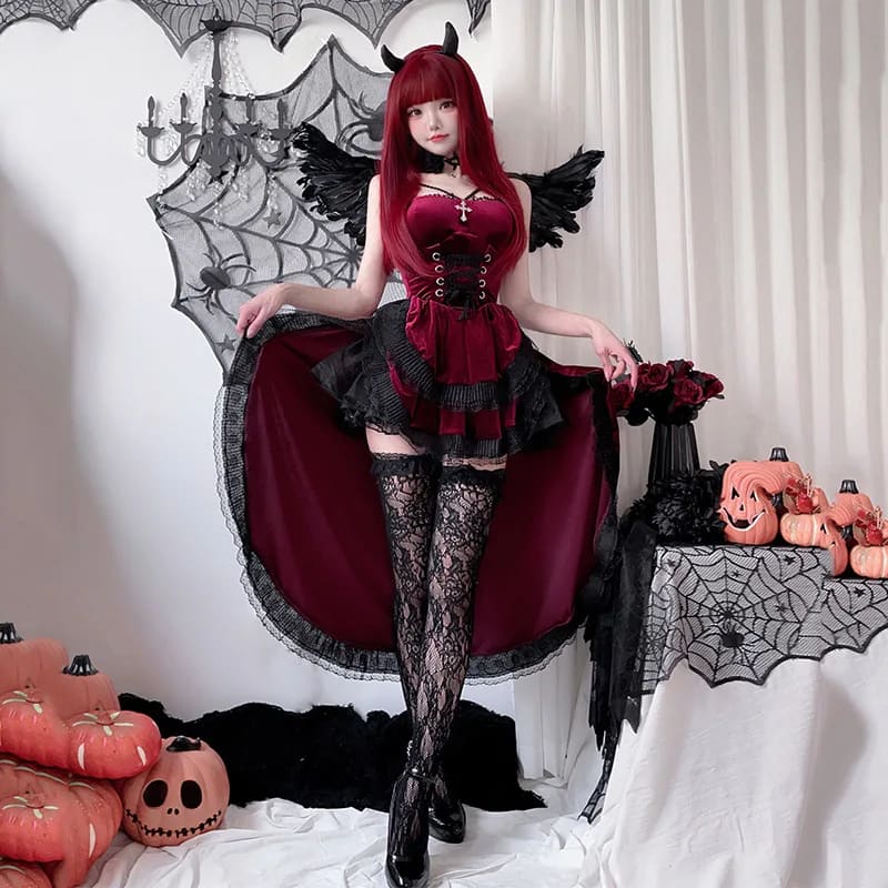 Model spreading the skirt of a burgundy gothic high-low dress to show its long back hem and black lace trim.