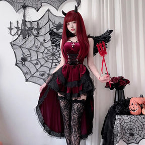 Front view of a burgundy Victorian-inspired gothic dress with a short front, long back hem and black lace edging.
