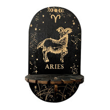 Aries wooden display shelf in black with a gold-tone ram, constellation lines, zodiac symbol and ARIES lettering.
