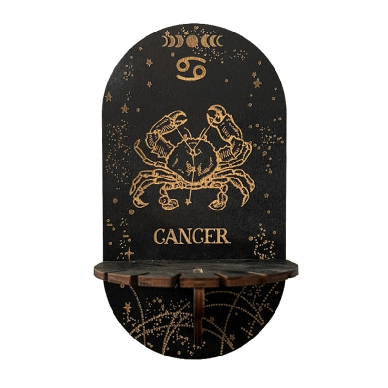 Black Cancer display shelf with a gold-tone crab illustration, constellation lines and a small projecting platform.
