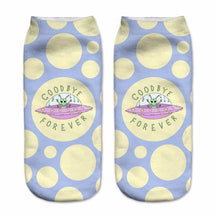 Blue socks with large yellow dots and a pink flying saucer, surrounded by the words Goodbye Forever.