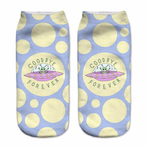 Blue socks with large yellow dots and a pink flying saucer, surrounded by the words Goodbye Forever.