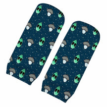 Navy socks with repeating green alien faces, gray flying saucers and tiny stars, arranged diagonally.