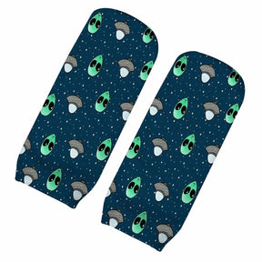 Navy socks with repeating green alien faces, gray flying saucers and tiny stars, arranged diagonally.