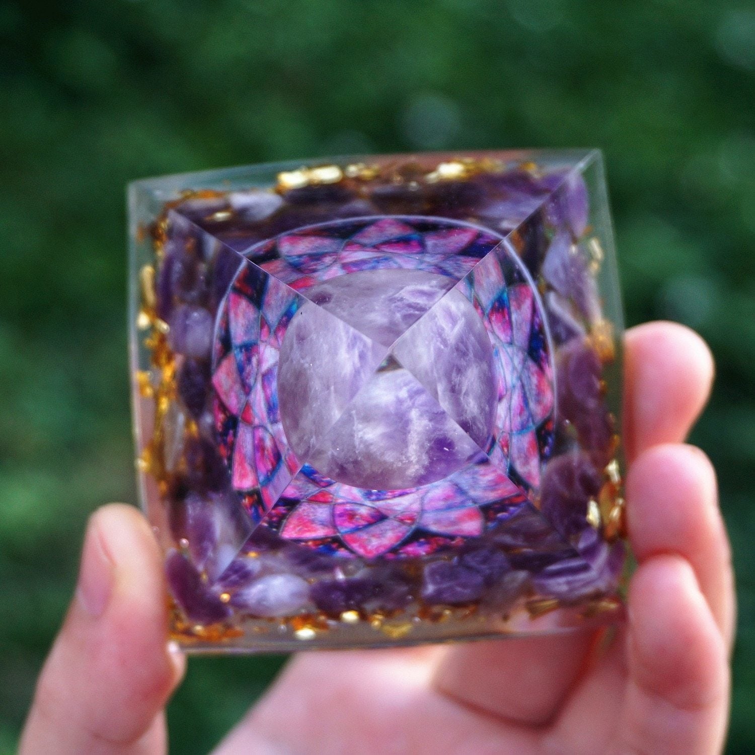 Overhead view of the pointed amethyst lotus pyramid, looking through the clear sides towards the purple sphere and lotus layers.