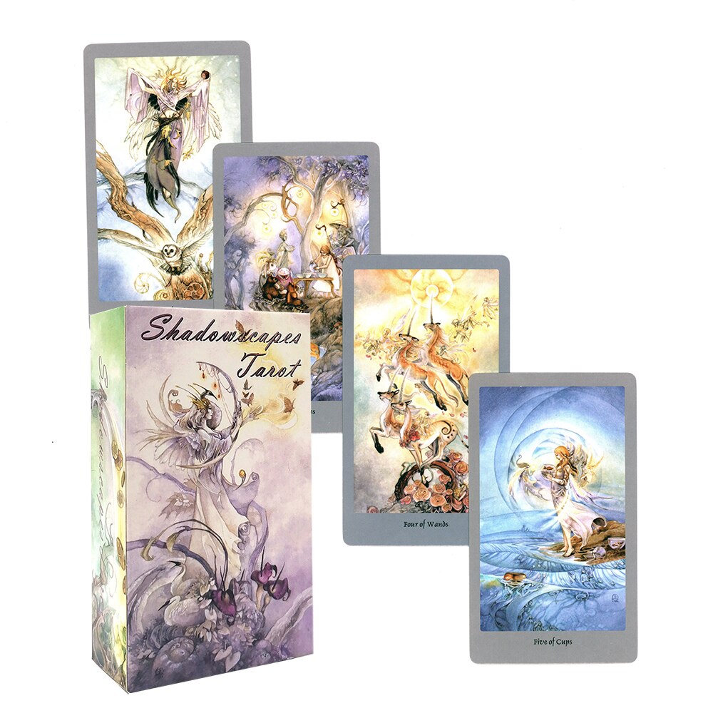 Fantasy tarot deck with its illustrated box and several cards, showing winged figures and softly coloured scenes.