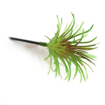 Green artificial succulent with fine pointed leaves forming a bushy head.