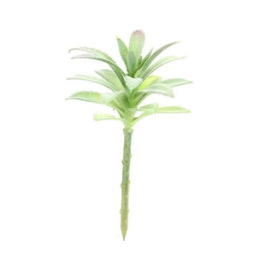 Green artificial succulent with overlapping layered leaves on a short stem.