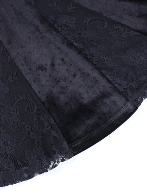 Close-up of alternating black velour and sheer floral lace panels at the dress hem.