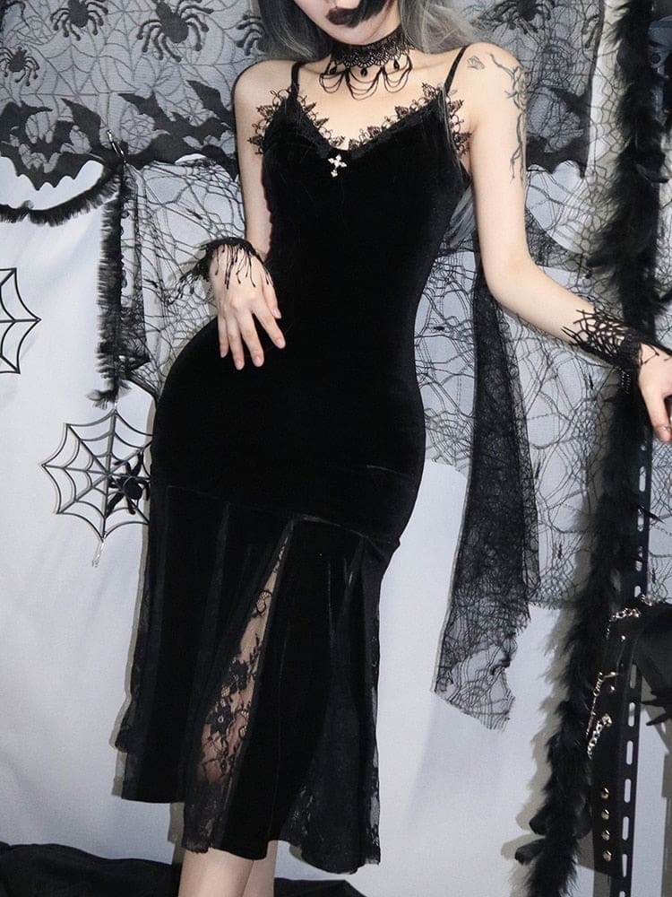 Black velour midi dress with fine lace at the neckline and sheer floral panels through the flared skirt. Shown with black lace accessories against a spiderweb backdrop.