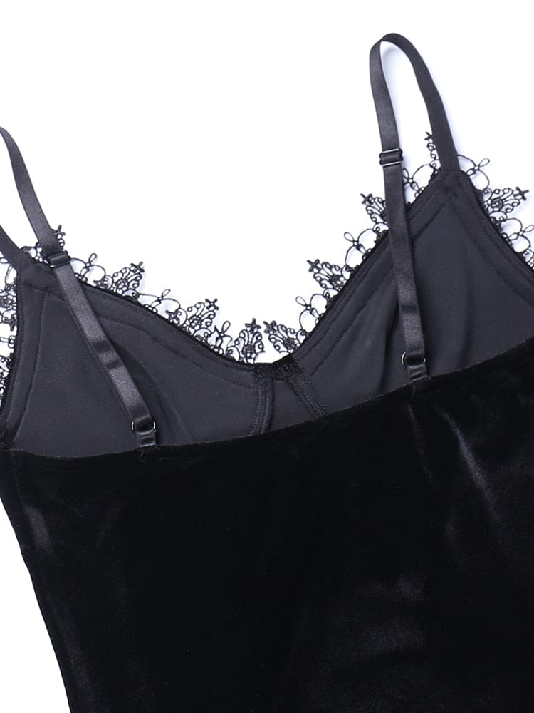 Interior view of the black dress bodice, with narrow straps, adjustment sliders and the reverse of the lace neckline trim visible.