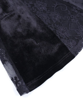Black velour skirt panel beside floral lace, showing the seam and stitched lower edge of the At the Altar dress.
