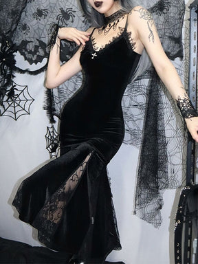 Black velour and floral lace dress shown at an angle with one knee raised, emphasizing the flared skirt and lace inserts.