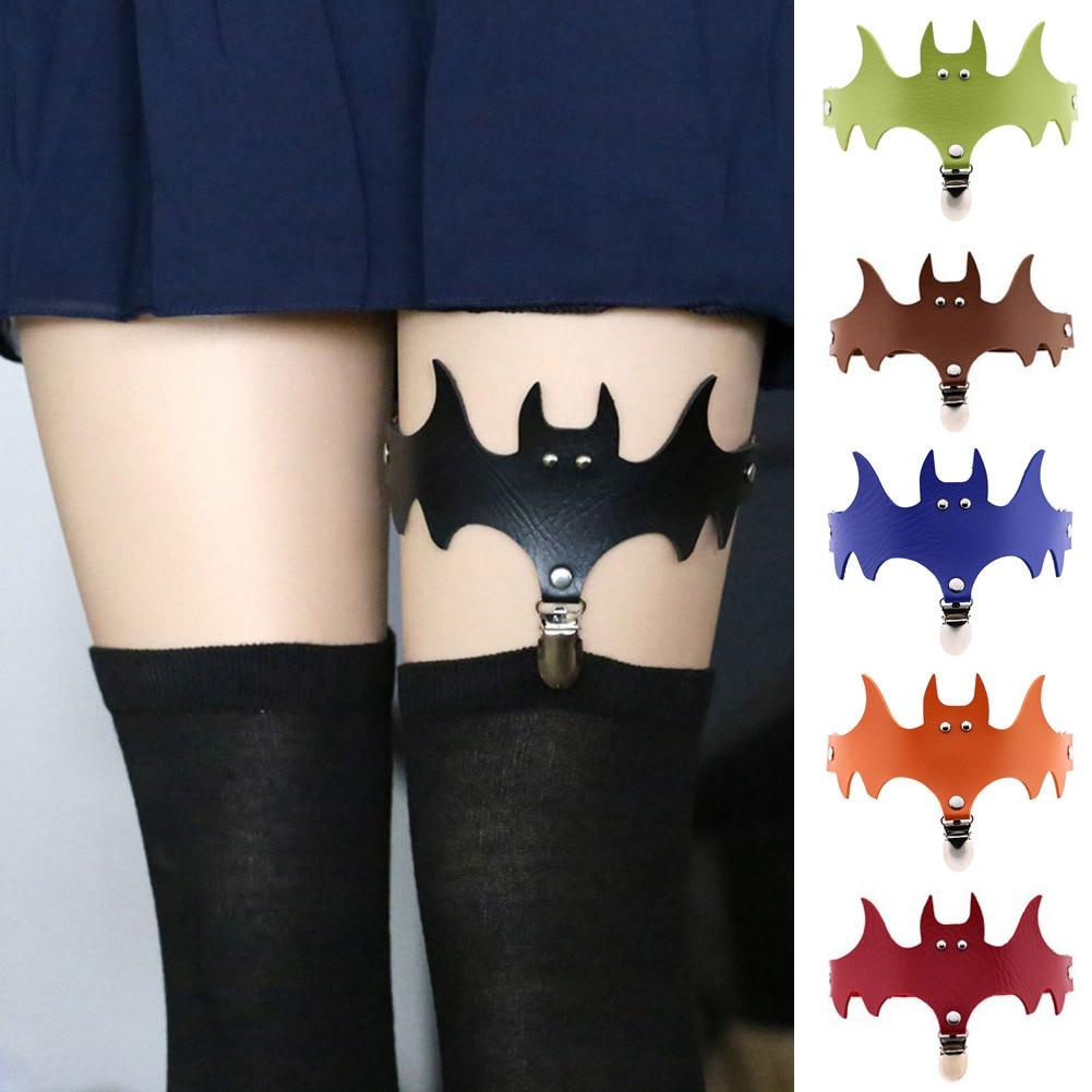 Collage of bat leg garters worn with stockings, showing different colour choices and the position of the clip.