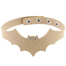 Beige faux leather bat wing choker shown fastened in a circle, with a scalloped front, pointed ears and two silver-tone eyelet eyes. The adjustable snap positions are visible across the back.