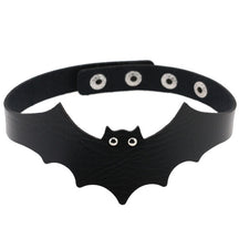 Black faux leather bat wing choker shown fastened in a circle, with a scalloped front, pointed ears and two silver-tone eyelet eyes. The adjustable snap positions are visible across the back.