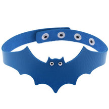 Bright blue faux leather bat wing choker shown fastened in a circle, with a scalloped front, pointed ears and two silver-tone eyelet eyes. The adjustable snap positions are visible across the back.