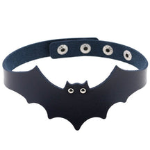 Navy faux leather bat wing choker shown fastened in a circle, with a scalloped front, pointed ears and two silver-tone eyelet eyes. The adjustable snap positions are visible across the back.
