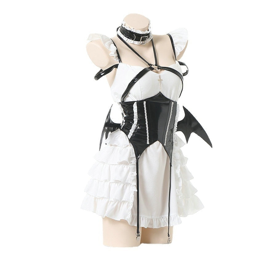 Bat-wing maid costume with a structured bodice, white ruffled skirt and crisscross back, available in black or pink.